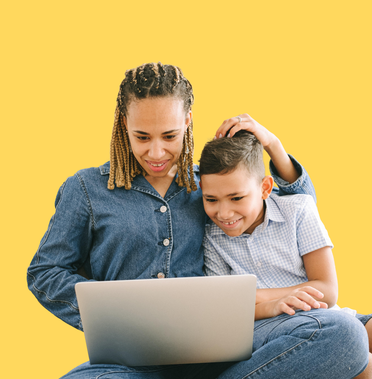 Mother and son using laptop